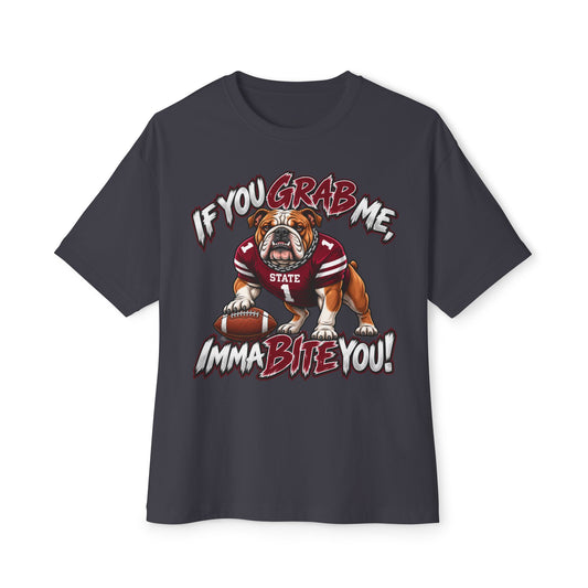 A dark charcoal gray short-sleeve t-shirt with a graphic of an bulldog wearing a red and white football jersey, holding a football, with the text 'IF YOU GRAB ME, IMMA BITE YOU!' in red and white stylized lettering.